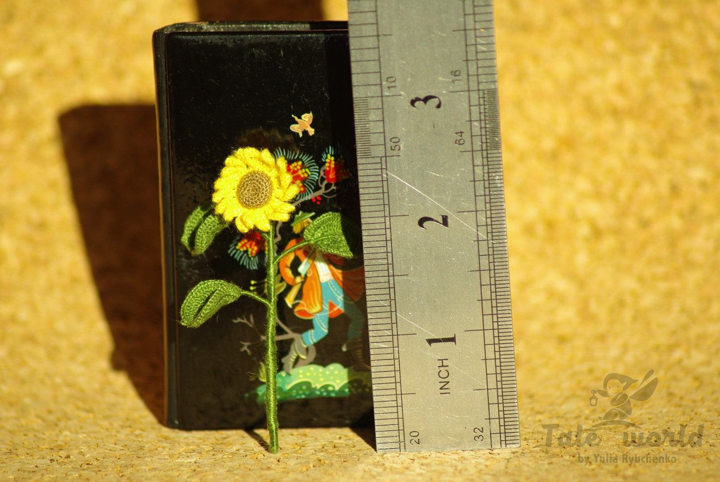 Miniature crochet sunflower