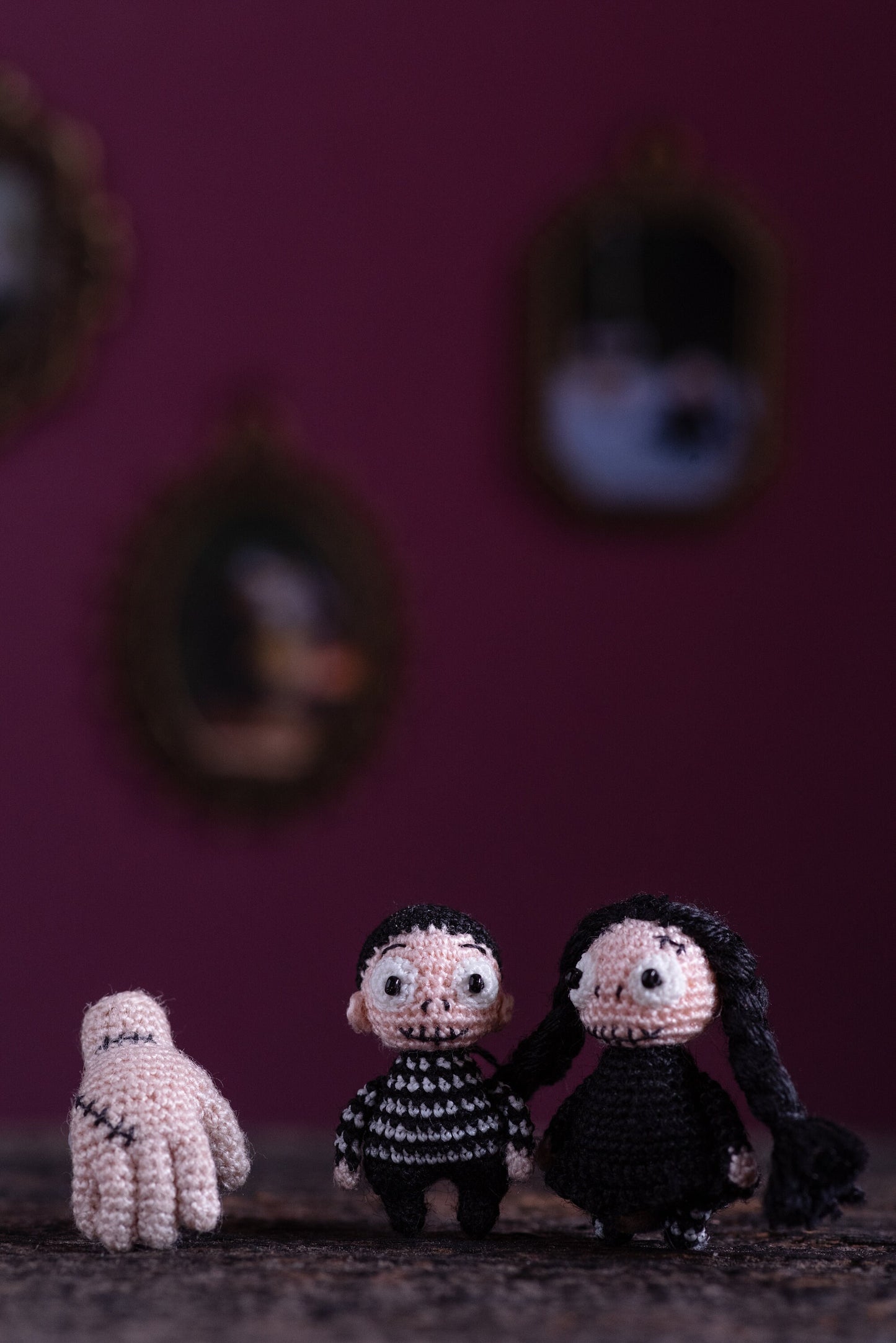 TaleWorld spooky miniature — black and white striped crochet boy doll.