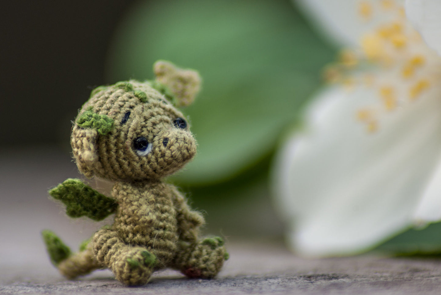 Handmade miniature dragon photographed in natural light