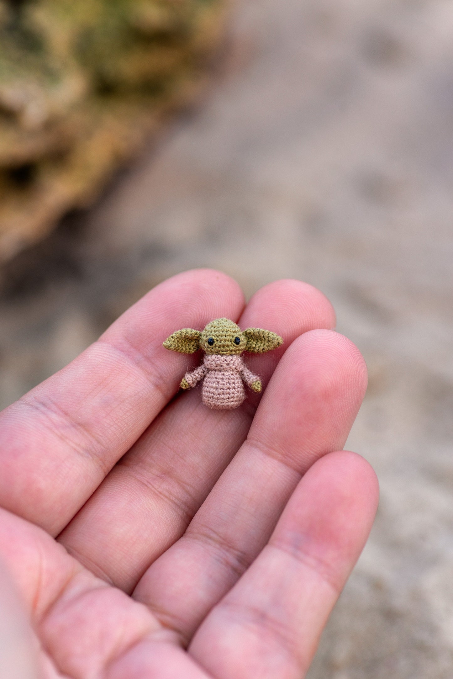 Handmade micro amigurumi alien figure with big ears