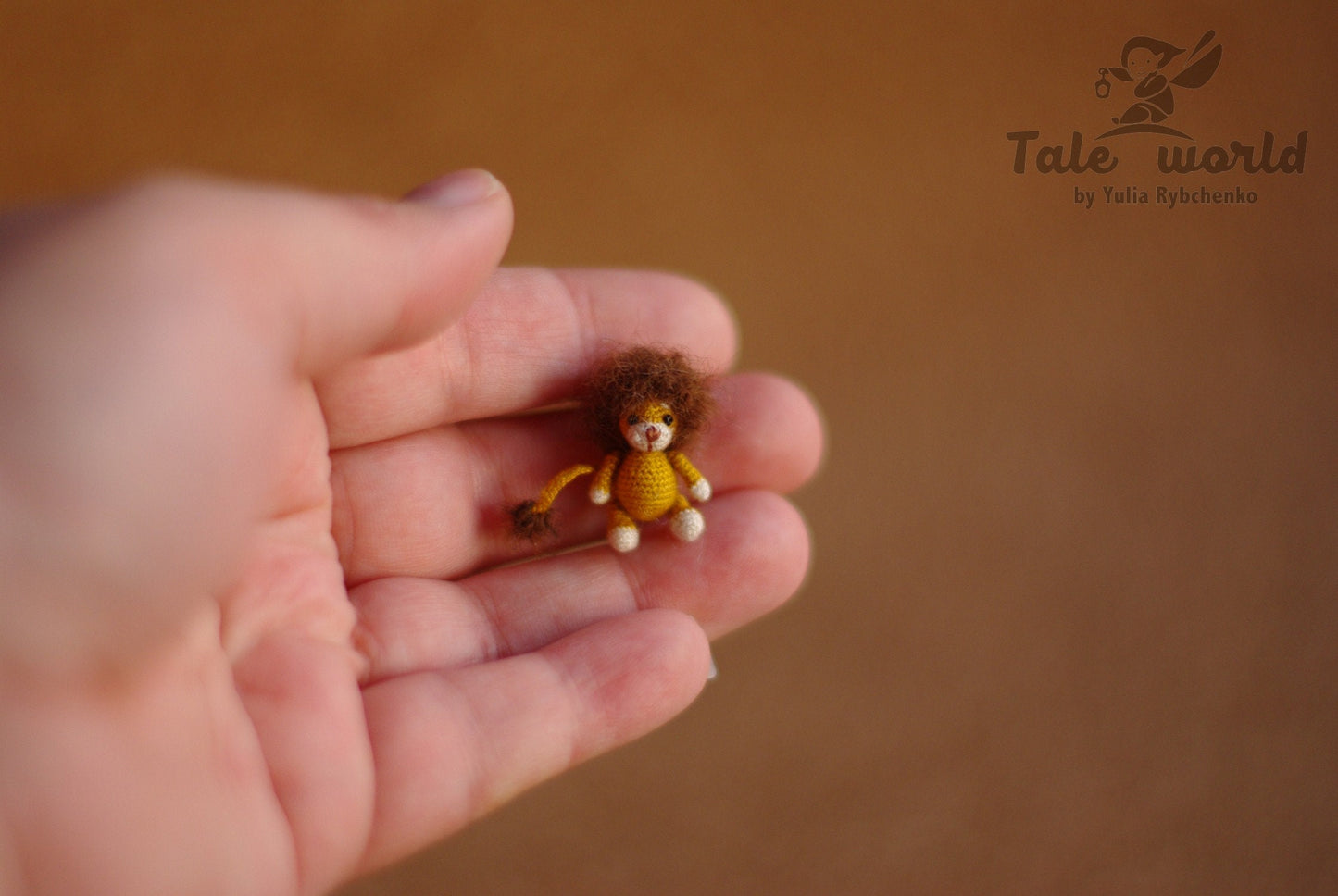 Pocket-sized lion crafted with cotton and natural wool, perfect for collectors