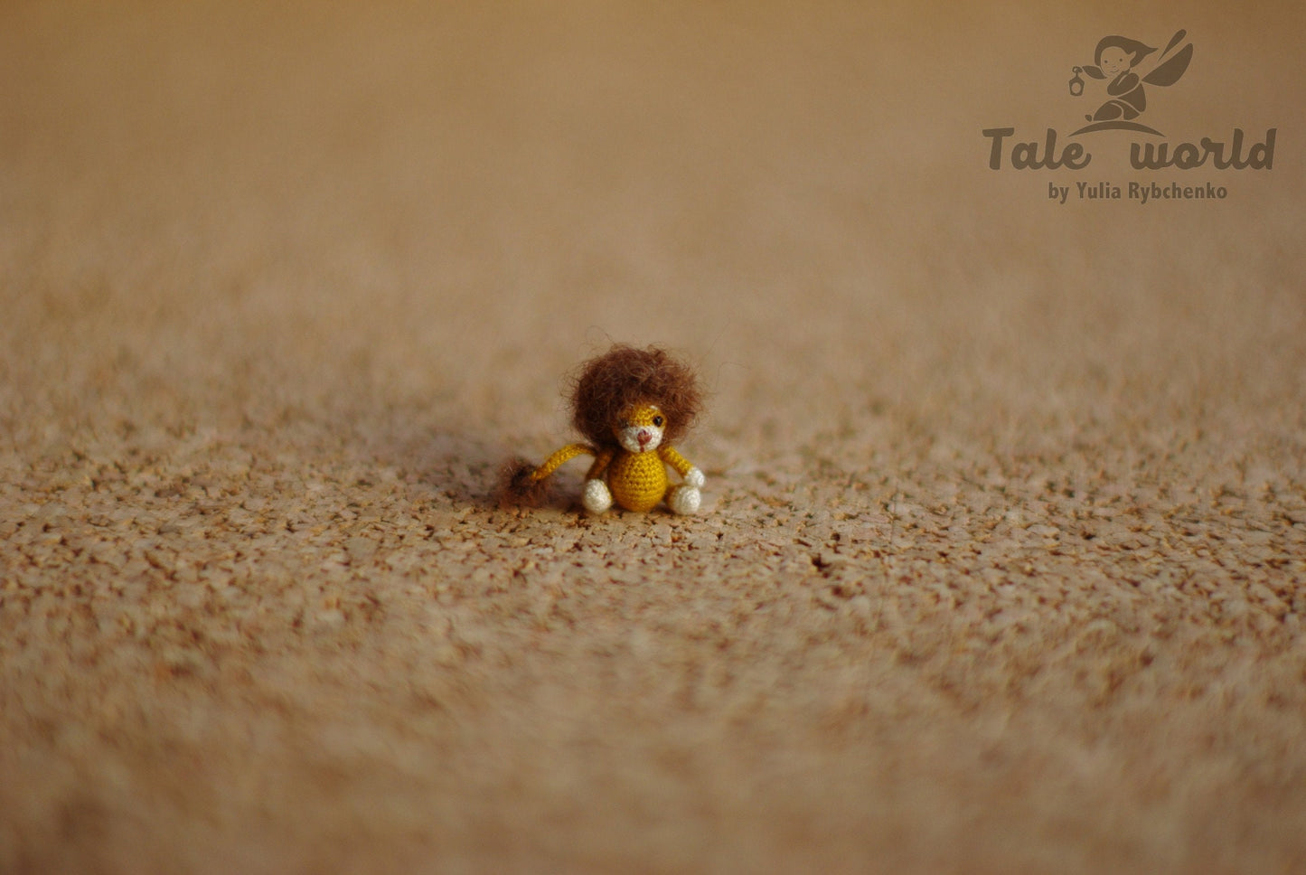 TaleWorld lion miniature in golden tones, ready to guard your story shelf