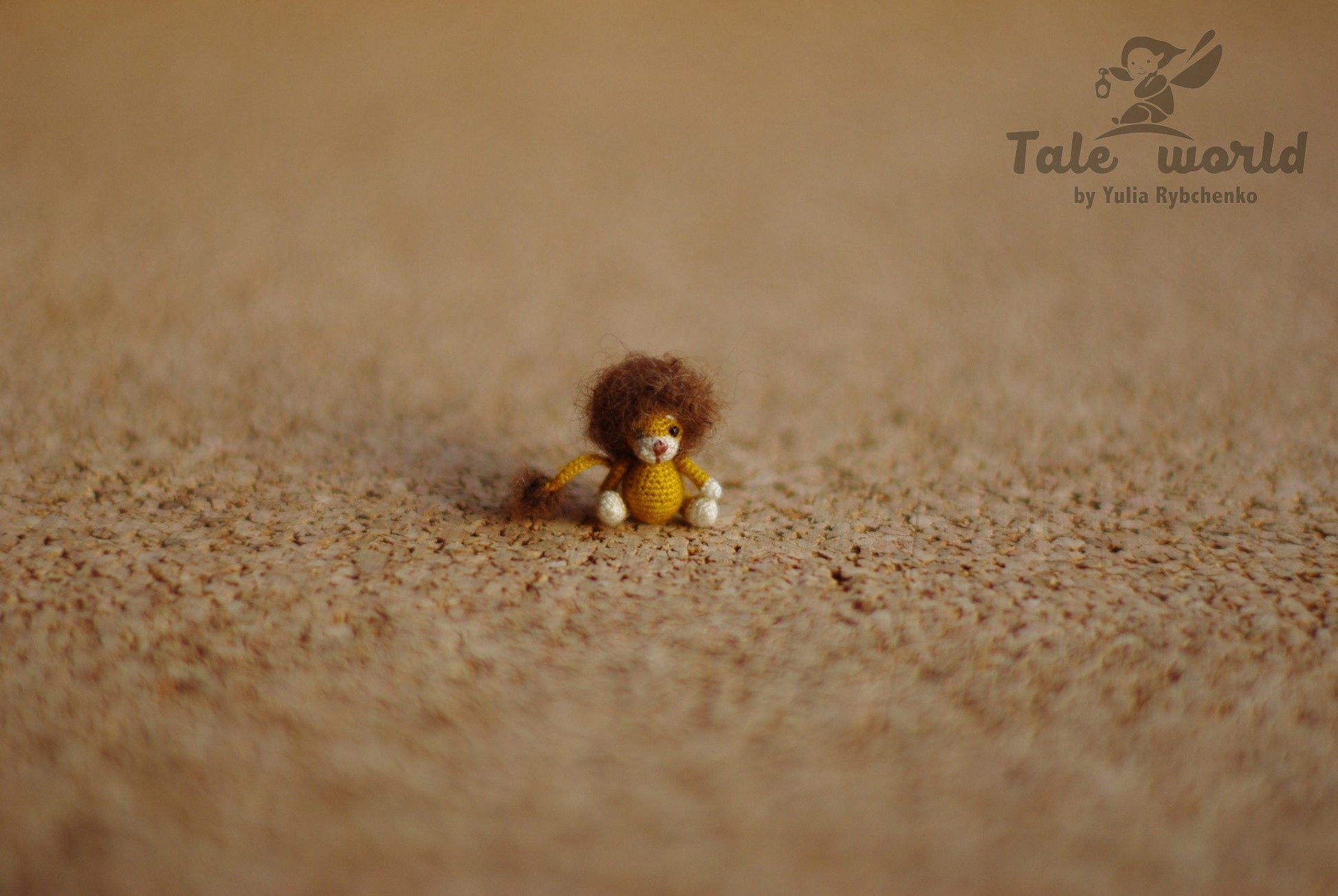 TaleWorld lion miniature in golden tones, ready to guard your story shelf