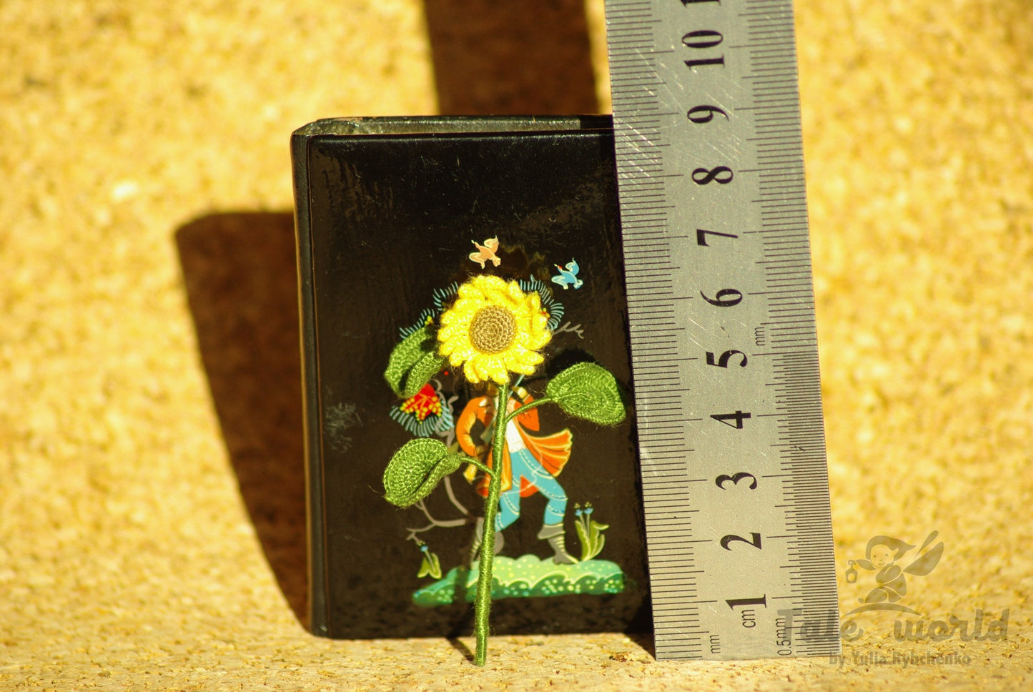 Miniature crochet sunflower