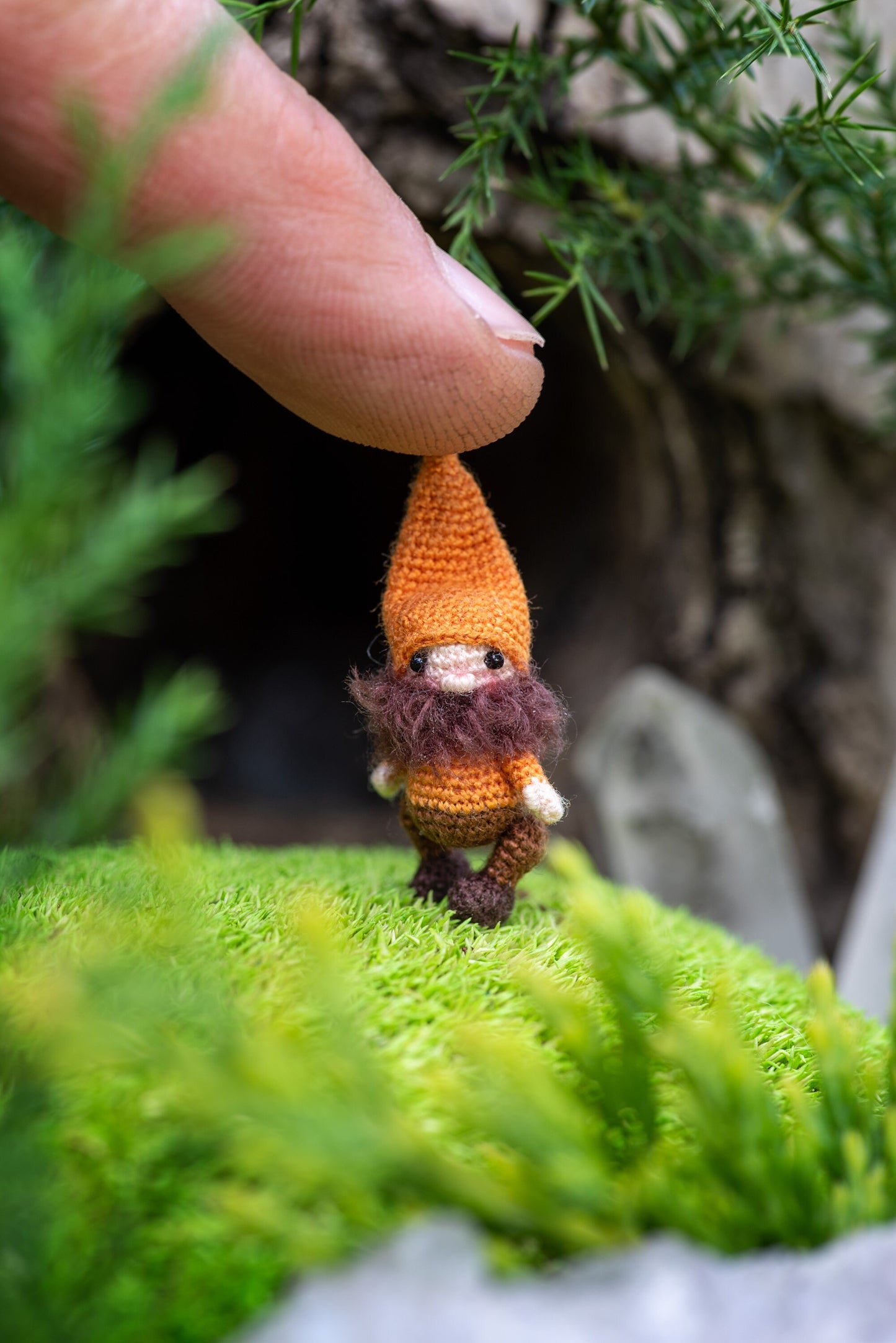 Woodland gnome and friend resting near golden candlesticks and autumn treasures
