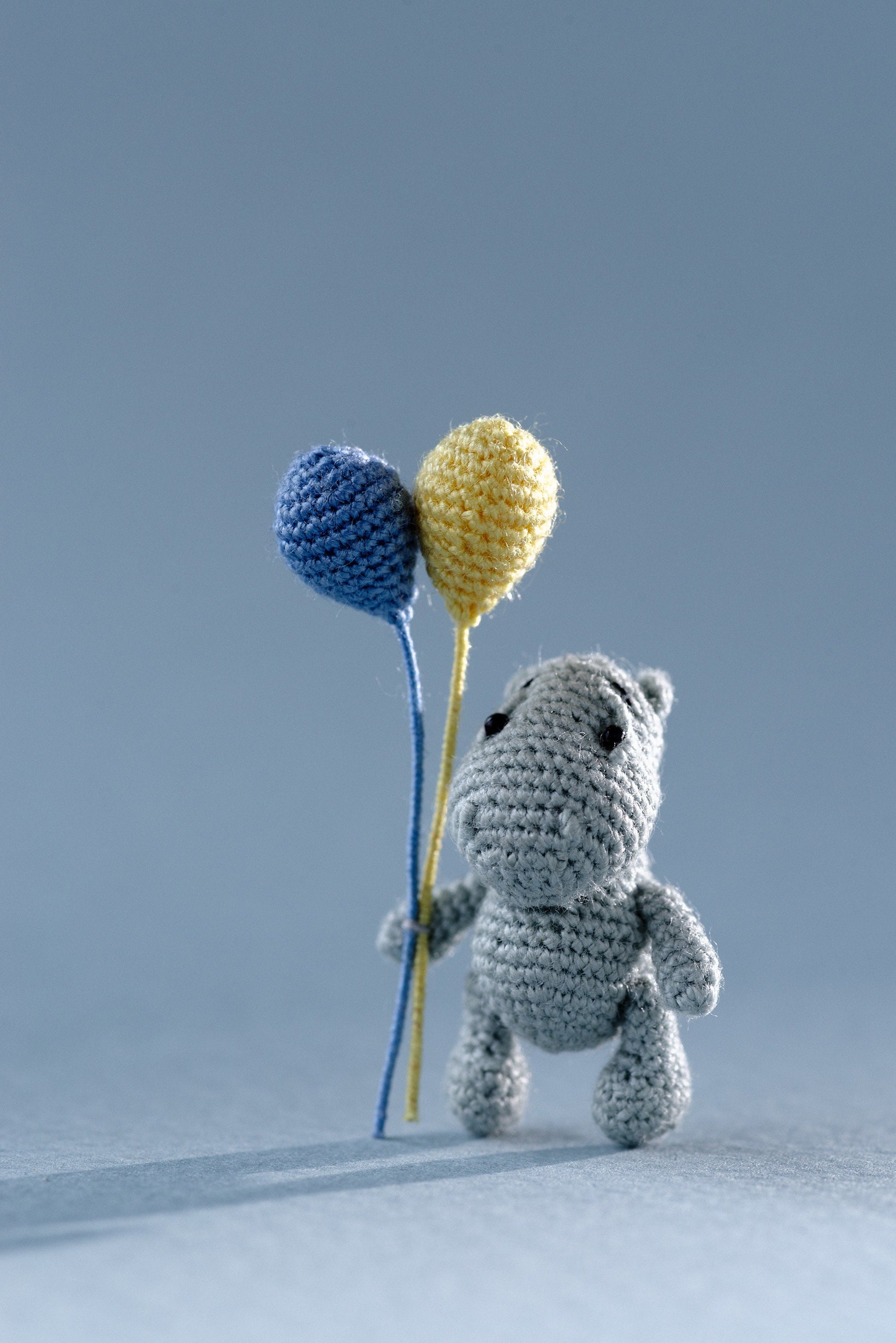 Two-inch hippo toy with balloons and rainbow sweets