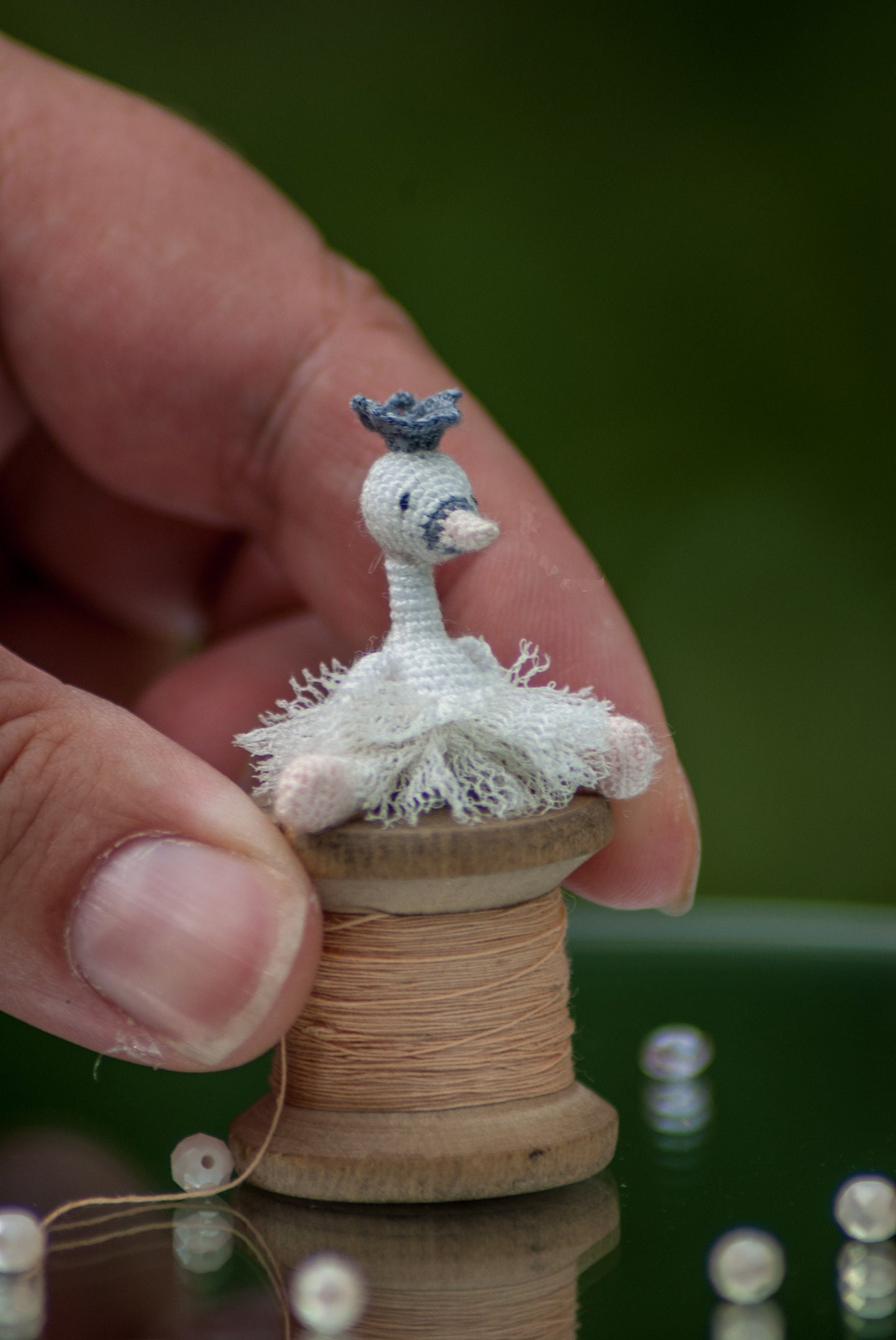Miniature crochet swan with crown handmade