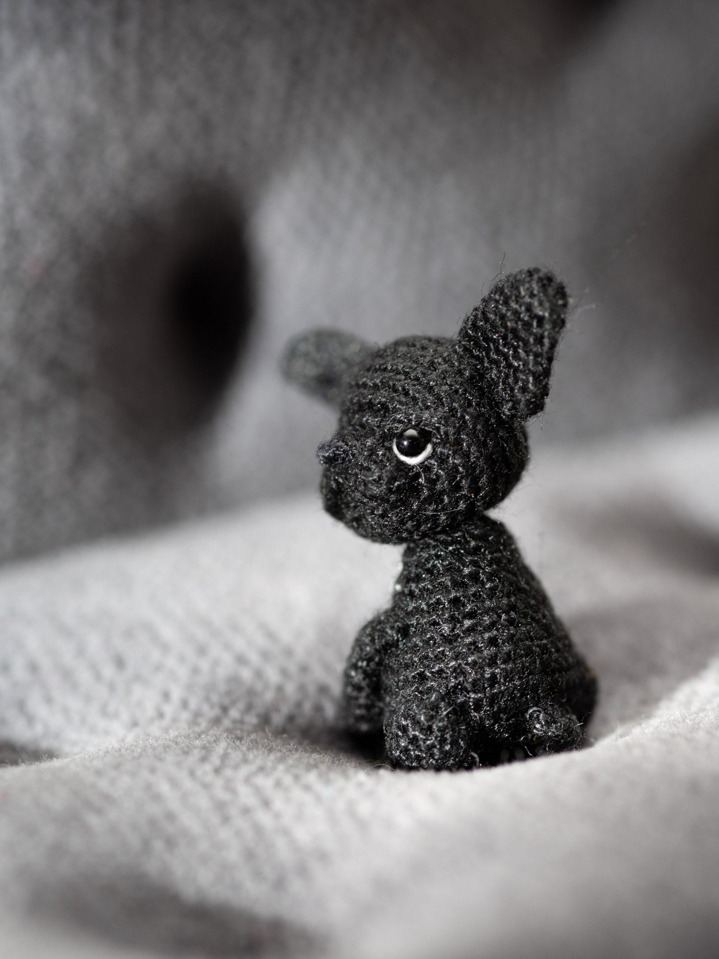 Handmade black Frenchie figure on soft wool fabric