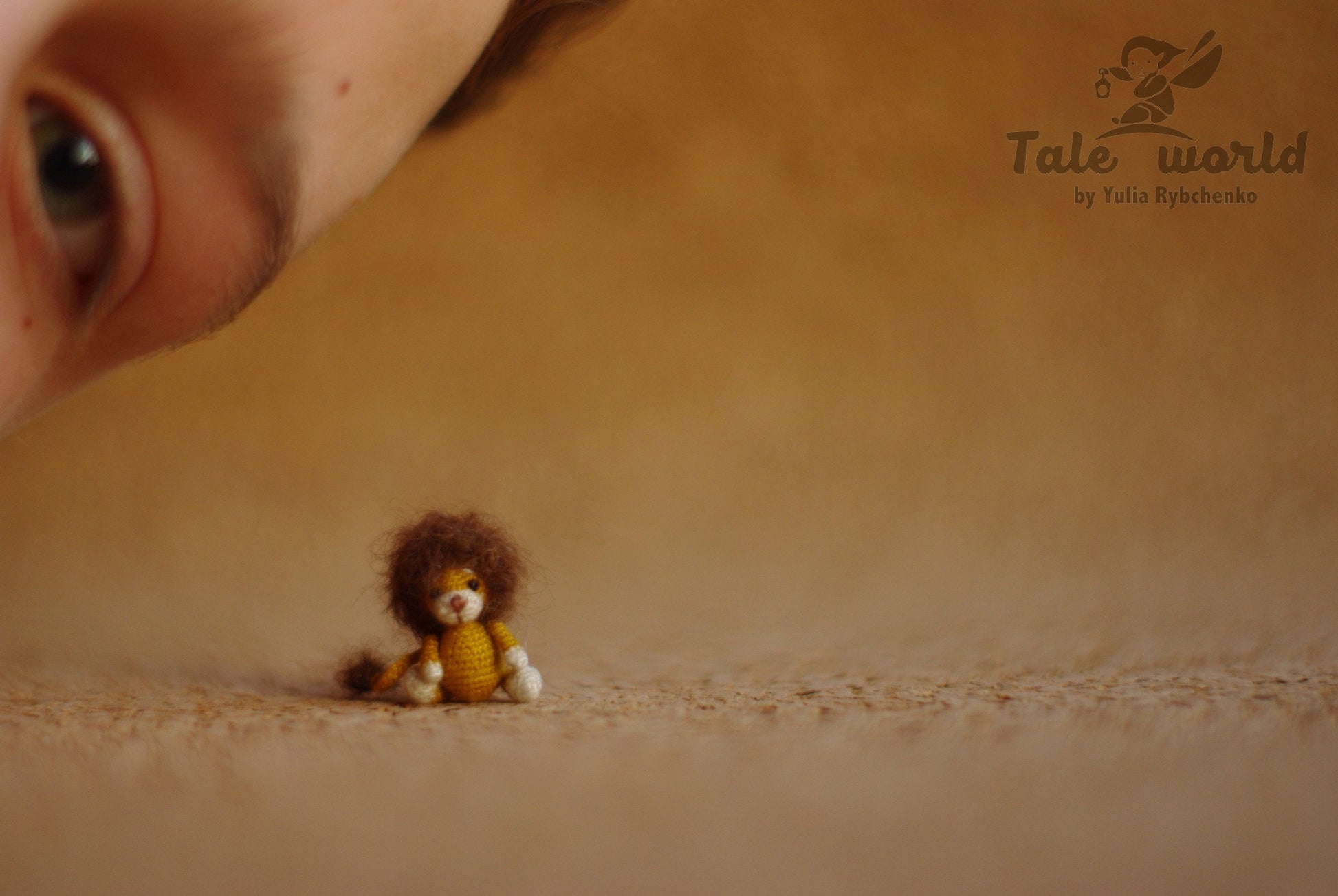 Handmade miniature lion with soft wool hair and stitched face