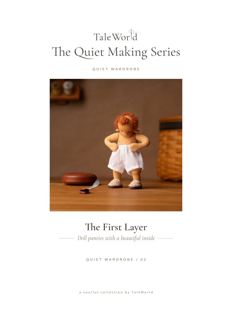 Cover of The First Layer: a small doll in white batiste panties on an oak table.